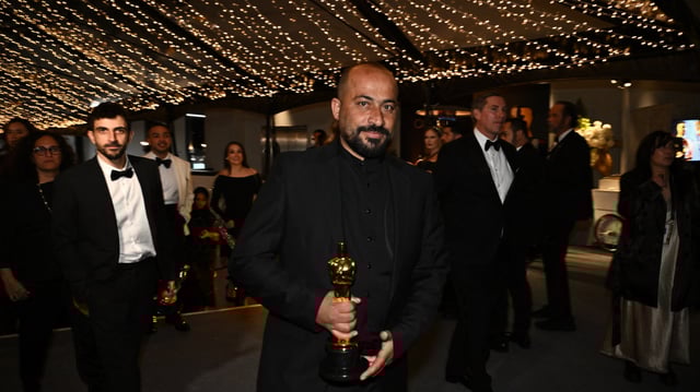 Hamdan Ballal with his Oscar for "No Other Land"