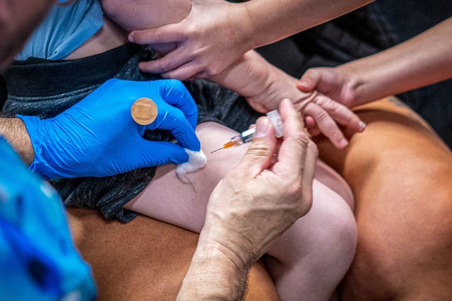 A child receives the MMR vaccine  on March 1, 2025, in Lubbock, Texas.
