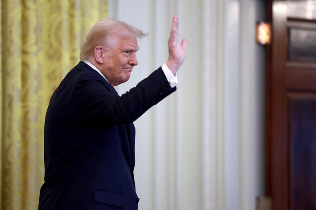 U.S. President Donald Trump leaves after hosting a Women's History Month event at the White House in Washington, D.C., U.S., March 26, 2025. REUTERS/Evelyn Hockstein
