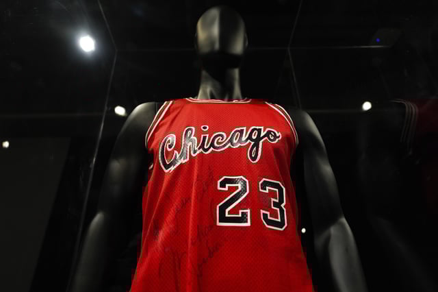 Michael Jordan's first game-worn Chicago Bulls jersey is displayed at Sotheby's, Friday, March 21, 2025, in New York, where they are set to be auctioned. (AP Photo/Julia Demaree Nikhinson)
