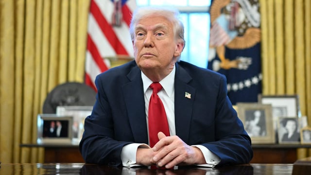 US President Donald Trump announces tariffs on auto imports in the Oval Office of the White House in Washington, DC, on March 26, 2025. Trump announced imposition of 25 percent tariffs on all cars and light trucks not built on US soil.