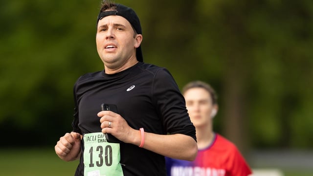 Rep. Chris Pappas (D-N.H.) runs in a road race in May 2023 in Anacostia Park in Washington, D.C. Photo: Simon Bruty/Getty Images