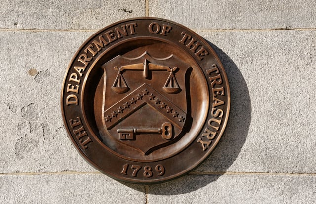 A bronze seal for the Department of the Treasury is shown at the U.S. Treasury building in Washington, U.S., January 20, 2023.  REUTERS/Kevin Lamarque/File Photo