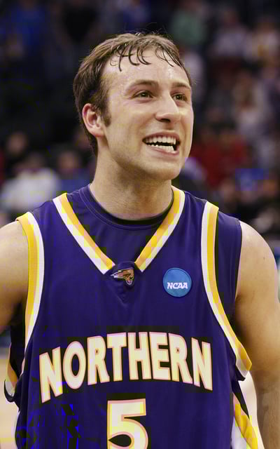 Northern Iowa guard Ali Farokhmanesh smiles after his team defeated Kansas in their NCAA Division I Men's Basketball Tournament game in Oklahoma City, Oklahoma, March 20, 2010.  REUTERS/Bill Waugh/File Photo