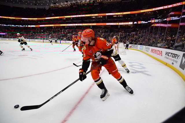 Mar 26, 2025; Anaheim, California, USA; Anaheim Ducks defenseman Drew Helleson (43) moves the puck against the Boston Bruins during the third period at Honda Center. Mandatory Credit: Gary A. Vasquez-Imagn Images