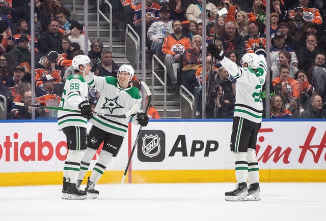 Dallas Stars' Thomas Harley (55), Jason Robertson (21) and Roope Hintz (24) celebrate a goal against the Edmonton Oilers during second period NHL action in Edmonton on Wednesday, March 26, 2025.