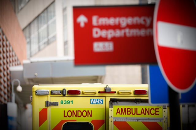 An ambulance sits outside the emergency department of the Royal London Hospital in London, England, on January 26, 2021. Data from the UK's official statistics bodies revealed today that, based on death certificates, up to January 15 this year nearly 104,000 people have died with coronavirus since the pandemic began. Government figures, which are based on deaths within 28 days of a positive covid-19 test, remain slightly lower, yesterday standing at 98,531. (Photo by David Cliff/NurPhoto via Getty Images)
