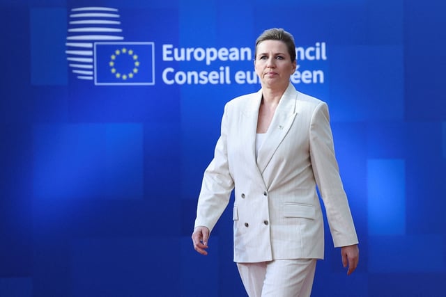 Denmark's Prime Minister Mette Frederiksen walks to attend a European Union summit in Brussels, Belgium March 20, 2025. REUTERS/Yves Herman/File photo