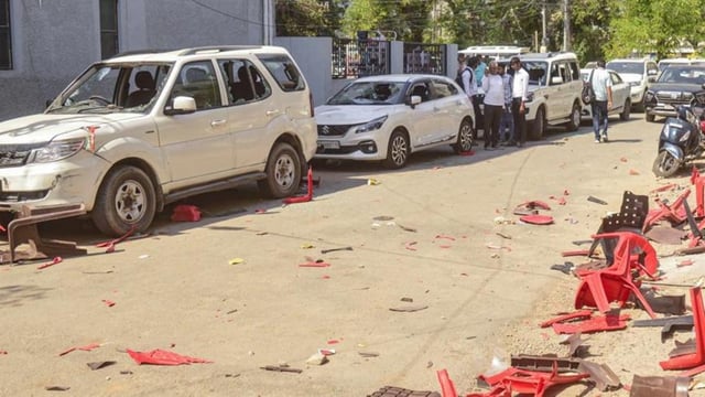 Broken chairs and damaged cars outside Samajwadi Party MP Ramji Lal Suman’s residence after it was attacked allegedly by Karni Sena workers in Agra.