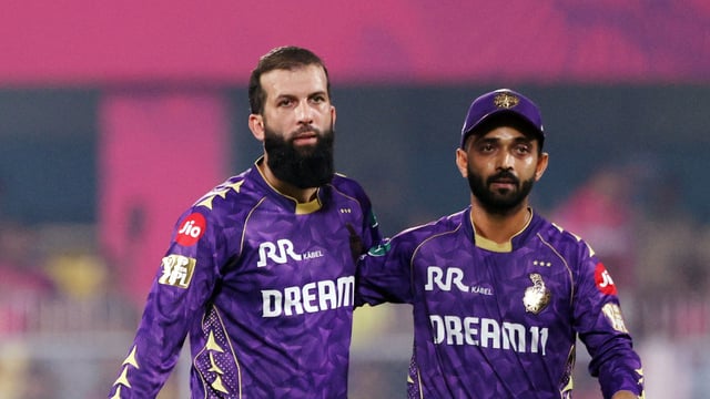 Moeen Ali with KKR captain Ajinkya Rahane after dismissing Yashasvi Jaiswal.