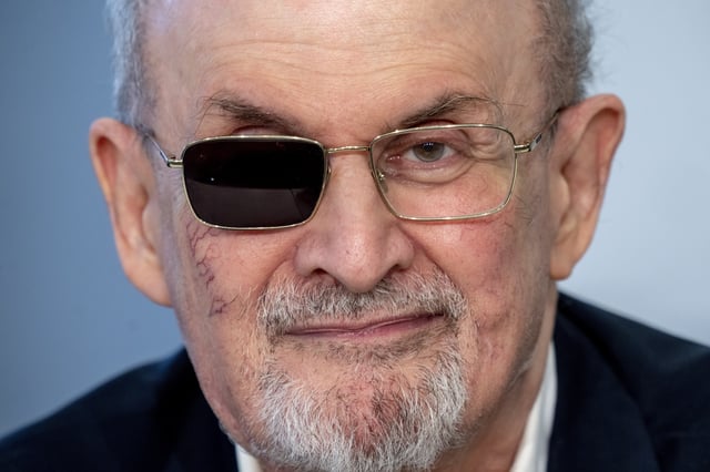 FILE - Author Salman Rushdie appears at a press conference at the Book Fair in Frankfurt, Germany on Oct. 20, 2023. (AP Photo/Michael Probst, File)
