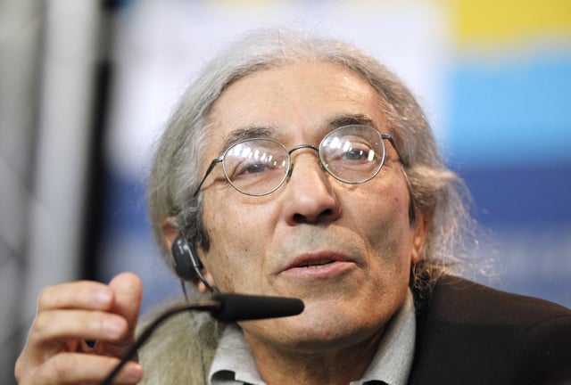 FILE - Algerian author Boualem Sansal speaks during the 62 edition of International Film Festival Berlinale, in Berlin Thursday, Feb. 9, 2012. (AP Photo/Markus Schreiber, File)