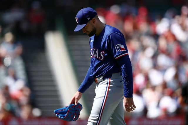 ANAHEIM, CALIFORNIA - SEPTEMBER 29: Nathan Eovaldi #17 of the Texas Rangers reacts after the final out of the fifth inning against the Los Angeles Angels at Angel Stadium of Anaheim on September 29, 2024 in Anaheim, California. (Photo by Katelyn Mulcahy/Getty Images)