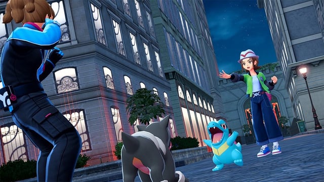 Totodile doing battle with a Houndour in Pokémon Legends Z-A