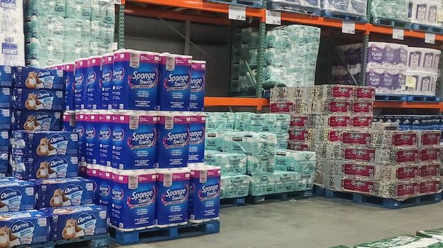 EDMONTON, CANADA - MARCH 2:
A customer is looking for a 30-pack of toilet paper from a store shelf in Edmonton, Alberta, Canada, on March 2, 2025.