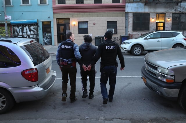 Immigration and Customs Enforcement (ICE), officers arrest an undocumented Mexican immigrant during a raid in the Bushwick neighborhood of Brooklyn on April 11, 2018 in New York City.