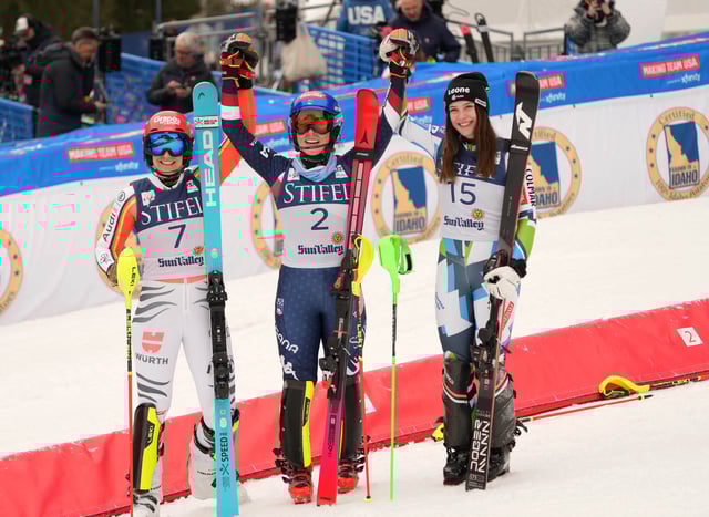 Mar 27, 2025; Sun Valley, ID, USA; Podium finishers from left Lena Duerr of Germany, Mikaela Shiffrin of the United States and Andreja Slokar of Slovenia celebrate after the slalom alpine skiing race in the 2025 FIS Ski World Cup at Sun Valley. Mandatory Credit: Michael Madrid-Imagn Images