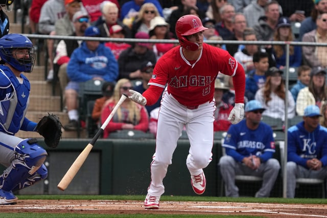 Mar 14, 2025; Tempe, Arizona, USA; Los Angeles Angels outfielder Mickey Moniak (8) hits a single again st the Kansas City Royals in the first inning at Tempe Diablo Stadium. Mandatory Credit: Rick Scuteri-Imagn Images/File Photo