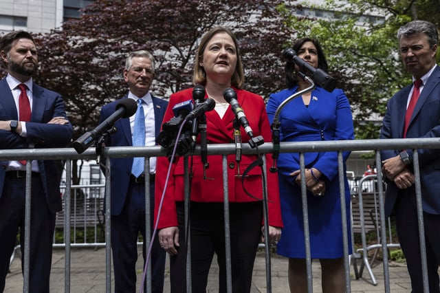 FILE - Iowa Attorney General Brenna Bird, center, accompanied by Sen. J.D. Vance, R-Ohio, left, Sen. Tommy Tuberville, R-Ala., second left, Rep. Nicole Malliotakis, R-N.Y., right, and Alabama Attorney General Steve Marshall, speaks at a news conference across the street from the Manhattan criminal court, Monday, May 13, 2024, in New York. (AP Photo/Stefan Jeremiah, File)