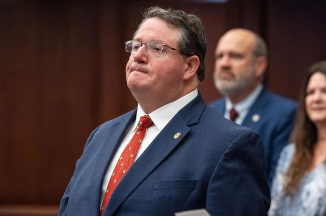 Florida Sen. Randy Fine stands for the pledge of allegiance during opening day of the Florida legislative session Tuesday, March 4, 2025, in Tallahassee, Florida.