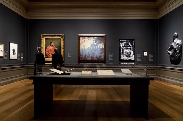 People look during the opening night of the Afro-Atlantic Histories exhibit at the Smithsonian's National Gallery of Art in Washington, April 7, 2022. (AP Photo/Andrew Harnik, File)