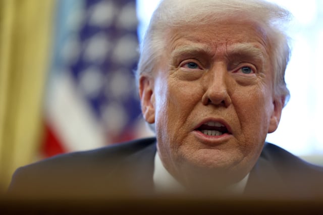 U.S. President Donald Trump speaks to the media in the Oval Office at the White House in Washington, D.C., U.S., March 26, 2025. REUTERS/Evelyn Hockstein