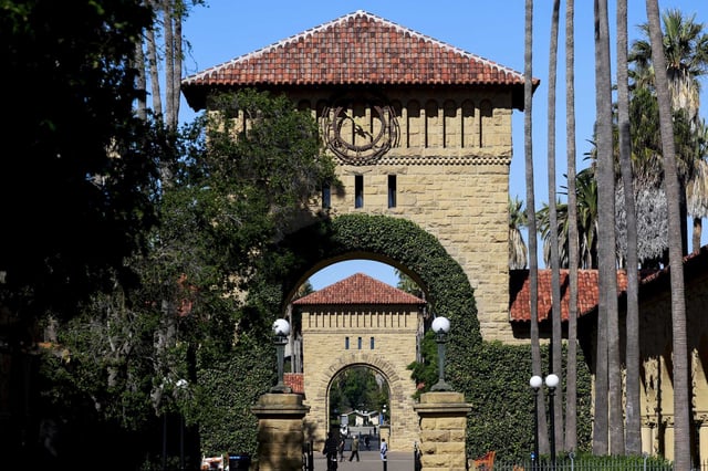 Students move through the Stanford University campus in Stanford. The U.S. Department of Justice has launched investigations into Stanford University and several University of California schools, including Berkeley, to see if they violate the Supreme Court’s 2023 ruling that bans race-based discrimination in college admissions.