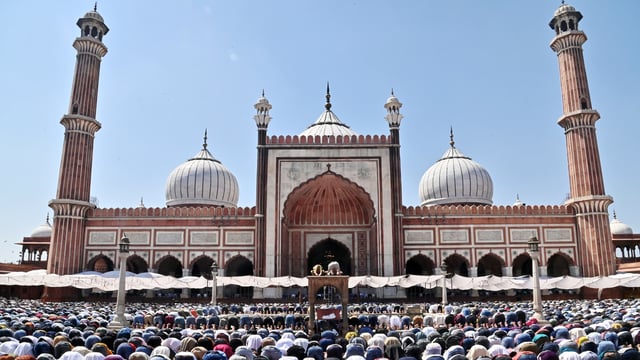 Devotees offer prayers (namaz) on the third Friday during the ongoing Ramadan month, at Jama Masjid in New Delhi. 