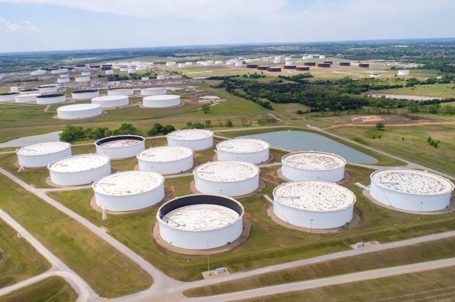 Crude oil storage tanks are seen in an aerial photograph at the Cushing oil hub in Cushing, Oklahoma, U.S. April 21, 2020. REUTERS/Drone Base/File Photo