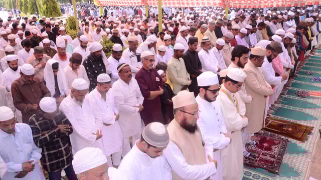 Eid ul Azha Namaz being offered at the Aisbagh Eidgah in Lucknow on Tuesday. 