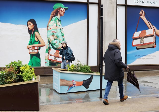 People walk on Regent Street in London, Britain April 10, 2023. REUTERS/Anna Gordon/File Photo