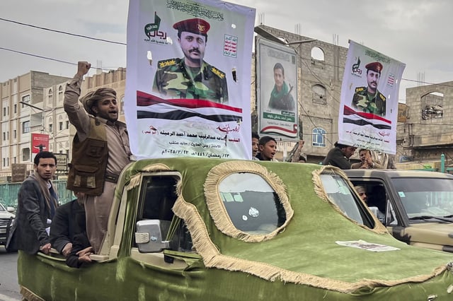 Houthi supporters participate in a funeral procession for Osama Al-rumeitha, a Houthi officer, who was reportedly killed in a recent U.S. airstrike, in Sanaa, Yemen, Monday, March 24, 2025.