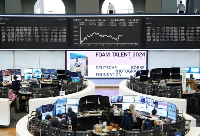 German share price index DAX graph is pictured at the stock exchange in Frankfurt, Germany, March 27, 2025. REUTERS/Staff