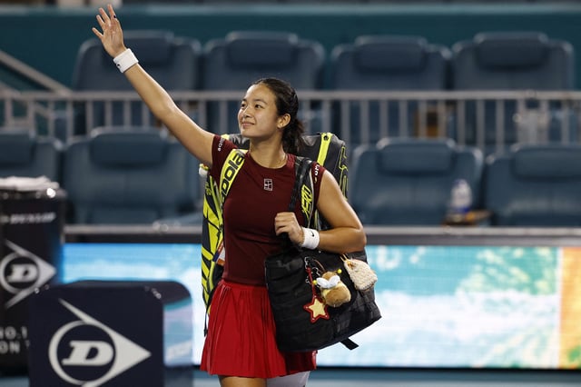 Mar 27, 2025; Miami, FL, USA; Alexandra Eala (PHL) waves to fans while leaving the court after her match against Jessica Pegula (USA)(not pictured) in a women's singles semifinal on day ten of the Miami Open at Hard Rock Stadium. Mandatory Credit: Geoff Burke-Imagn Images