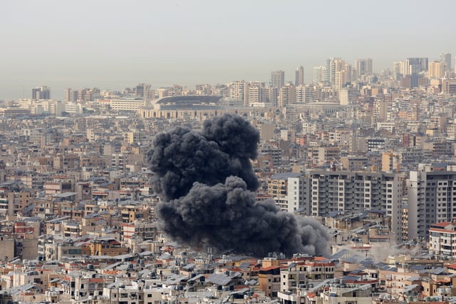 Smoke billows over Beirut's southern suburbs following Israeli strike after issuing an evacuation warning for the area, as seen from Baabda, Lebanon, March 28, 2025. REUTERS/Mohamed Azakir