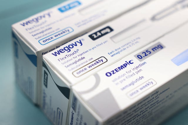 Boxes of Ozempic and Wegovy made by Novo Nordisk are seen at a pharmacy in London, Britain March 8, 2024. REUTERS/Hollie Adams/File Photo