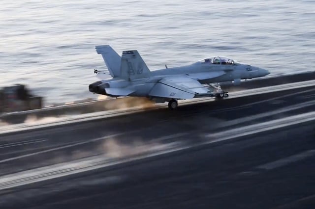 This image taken from video provided by the U.S. Navy shows an aircraft launching from the USS Harry S. Truman in the Red Sea before airstrikes in Sanaa, Yemen, Saturday, March 15, 2025.