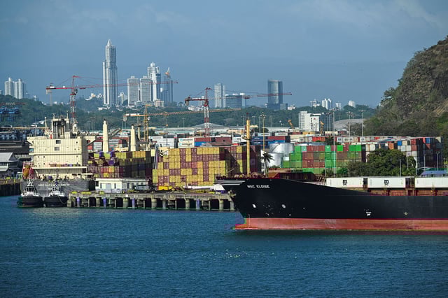 A cargo ship waits at Balboa port before crossing the Panama Canal in Panama City on February 4,2025.