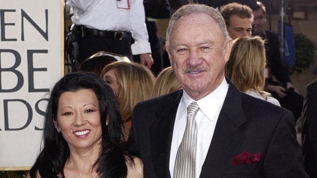 FILE – Actor Gene Hackman arrives with his wife, Betsy Arakawa, for the 60th Annual Golden Globe Awards in Beverly Hills, Calif., Sunday, Jan. 19, 2003. (AP Photo/Mark J. Terrill, File)