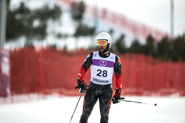 Olympic skier Berkin Usta has died in a hotel fire, the Turkish sports minister announced.