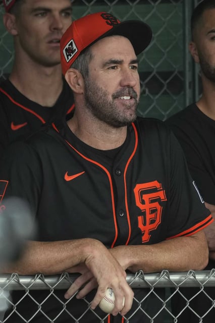 San Francisco Giants pitcher Justin Verlander watches other pitchers throw at the team&#39;s spring training baseball facility Thursday, Feb. 13, 2025, in Scottsdale, Ariz.