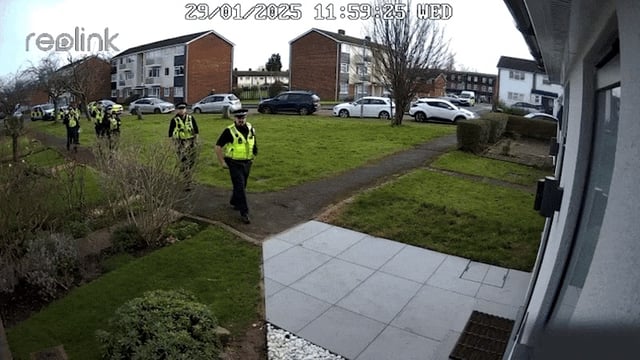 The arrival of six police officers at the parents’ home was captured by a CCTV camera