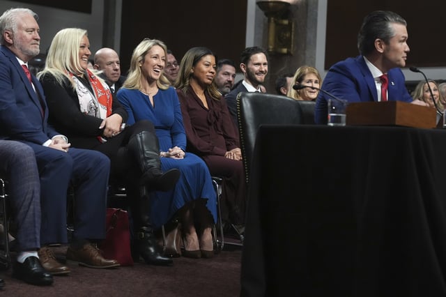 Jennifer Rauchet, third from left, and Phil Hegseth, fifth from left, listen as Pete Hegseth appears before the Senate Armed Services Committee for his confirmation hearing to be Defense Secretary, at the Capitol in Washington, Jan. 14, 2025. (AP Photo/Jacquelyn Martin, File)