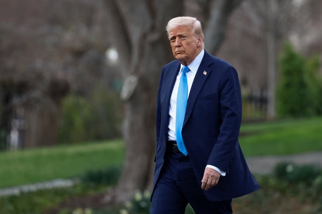 U.S. President Donald Trump walks before departing for Florida from the South Lawn at the White House in Washington, D.C., U.S., March 28, 2025. REUTERS/Evelyn Hockstein