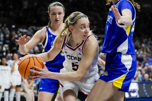Paige Bueckers of the Connecticut Huskies grabs the loose ball against the South Dakota State Jackrabbits during the second half of a second round game of the women’s NCAA basketball tournament at the Harry A. Gampel Pavilion on March 24, 2025 in Storrs, Connecticut. The Huskies defeated the Jackrabbits 91-57.