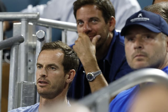 Mar 25, 2025; Miami, FL, USA; Andy Murray (L), coach of Novak Djokovic (SRB)(not pictured) looks on in front of Juan Martin del Potro (M) against Lorenzo Musetti (ITA)(not pictured) on day eight of the Miami Open at Hard Rock Stadium. Mandatory Credit: Geoff Burke-Imagn Images