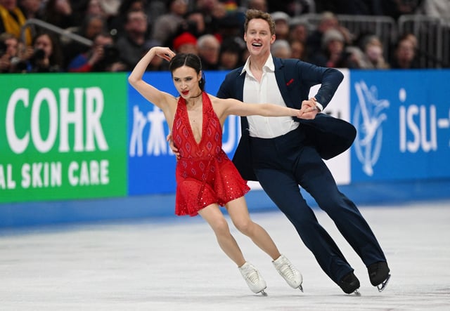Mar 28, 2025; Boston, Massachusetts, USA; Madison Chock (USA) and Evan Bates (USA) compete in the rhythm ice dance during the ISU World Figure Skating Championships at TD Garden. Mandatory Credit: Brian Fluharty-Imagn Images