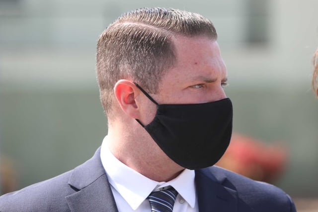 This Oct. 4, 2021 file photo shows then-Danville police officer Andrew Hall leaving the A.F. Bray Courts Building in Martinez.