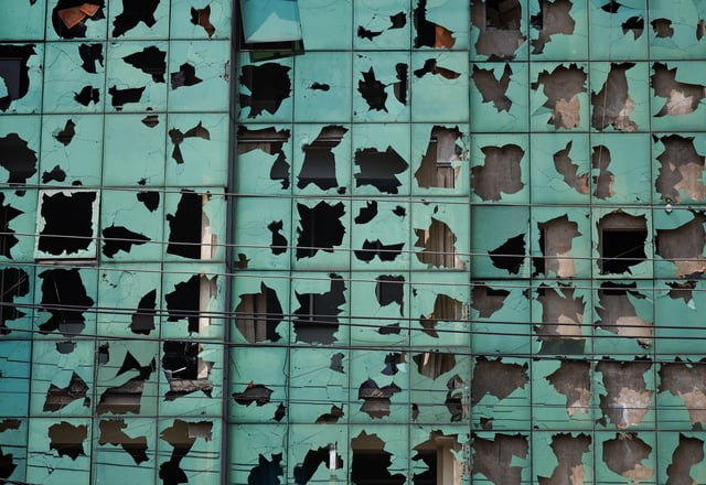 Windows smashed by stones hurled by the pro-monarchist demonstrators is seen during a protest demanding the restoration of Nepal's monarchy, which was abolished in 2008, saying the governments have failed to make any significant changes, in Kathmandu, Nepal, March 28, 2025. REUTERS/Navesh Chitrakar