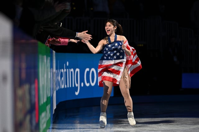 Alysa Liu celebrates her victory with fans on Friday night in Boston.
